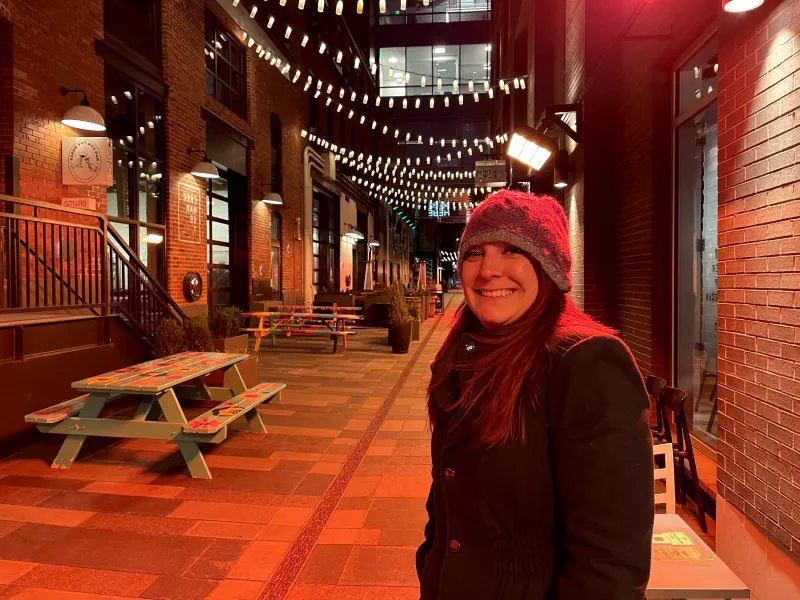 Emily Backes smiling at Milk Market in Denver