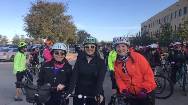 Women road cyclists riding together on bikes built for riders outside the typical user persona